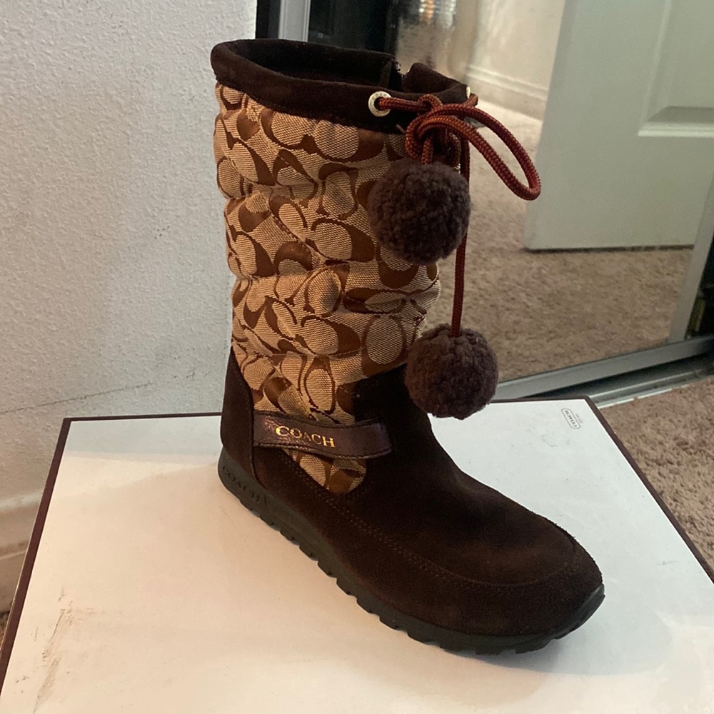 Above the ankle brown Coach winter boots!